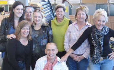 The women from the Emerald workshop farewell Neil Grigg at the airport. The women from the Emerald workshop farewell Neil Grigg at the airport.